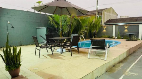 Casa com Piscina Ar condicionado a 60m do Mar e Rede de vôlei
